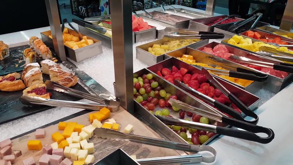Restaurant interior with grab-and-go food cases.
