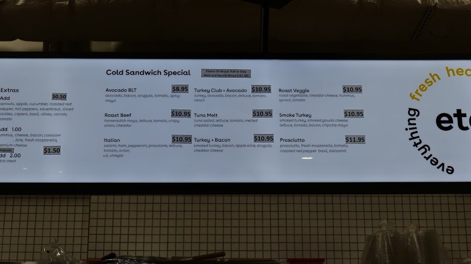 Food menu with fruit cup selections listed.